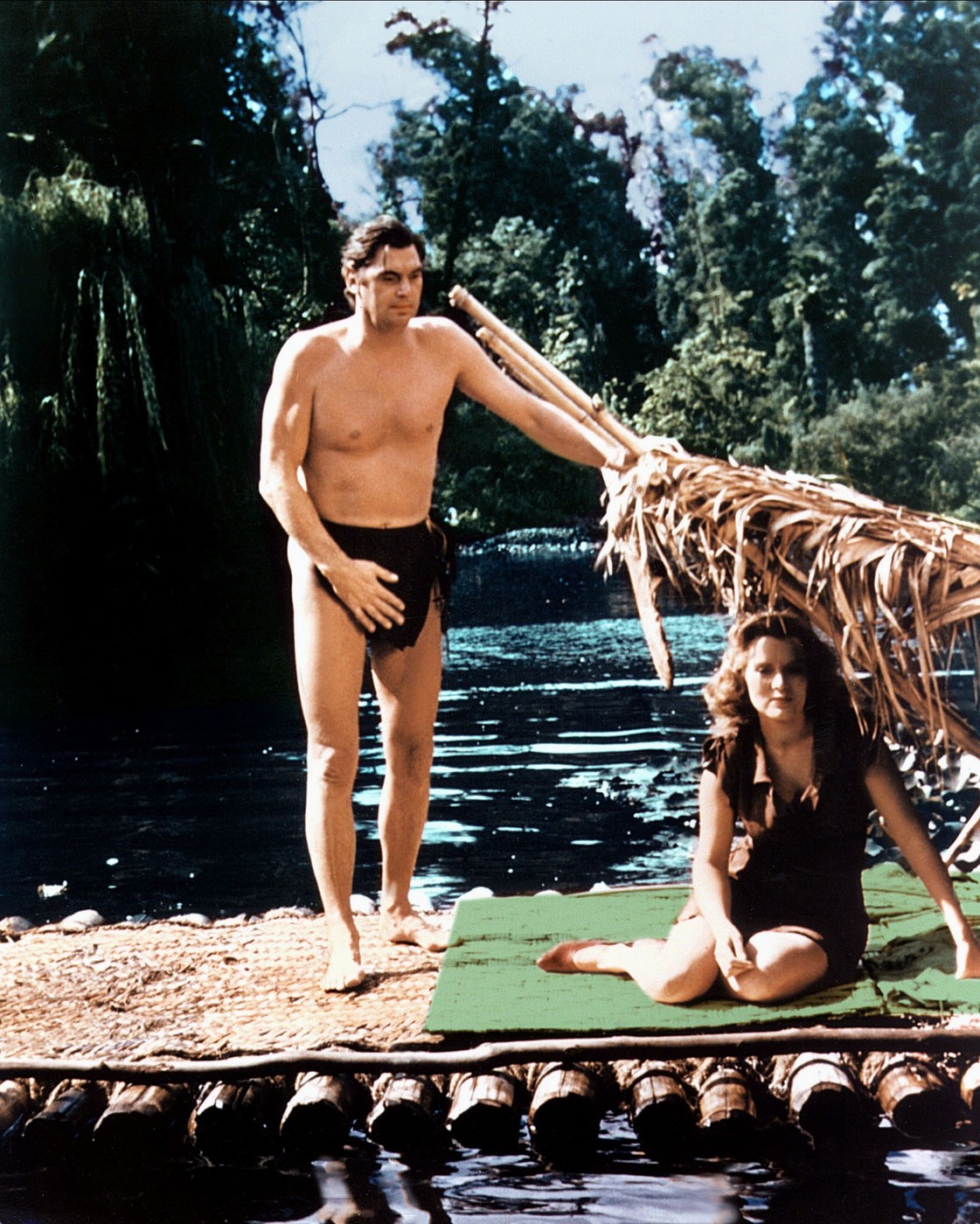 Johnny Weissmuller & Brenda Joyce Film: Tarzan And The Huntress (USA 1947)  Director: Kurt Neumann 05 April 1947     Date: 05-Apr-1947,Image: 418217472, License: Rights-managed, Restrictions: Please use full Credit line: Mary Evans/AF Archive. **Warning** This Photograph is for editorial use only and is the copyright of Rko and/or the Photographer assigned by the Film or Production Company & can only be reproduced by publications in conjunc, Model Release: no