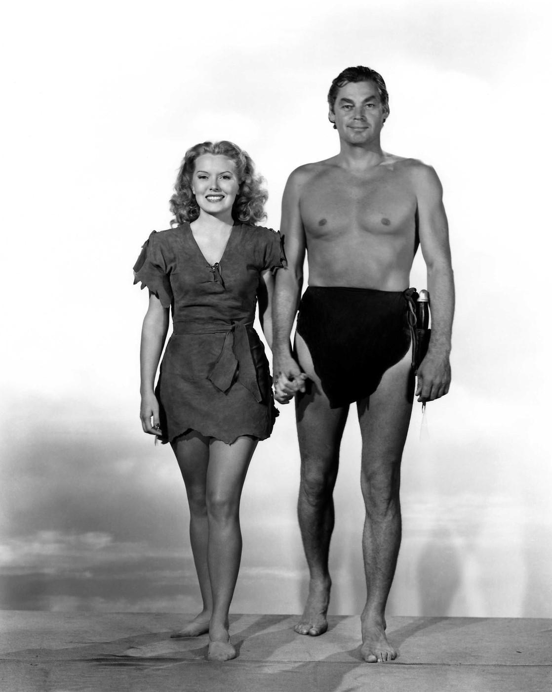 Brenda Joyce & Johnny Weissmuller  Characters: Jane, Tarzan Film: Tarzan And The Leopard Woman (USA 1946)  Director: Kurt Neumann 08 January 1946     Date: 08-Jan-1946,Image: 418237934, License: Rights-managed, Restrictions: Please use full Credit line: Mary Evans/AF Archive. **Warning** This Photograph is for editorial use only and is the copyright of Rko and/or the Photographer assigned by the Film or Production Company & can only be reproduced by publications in conjunc, Model Release: no