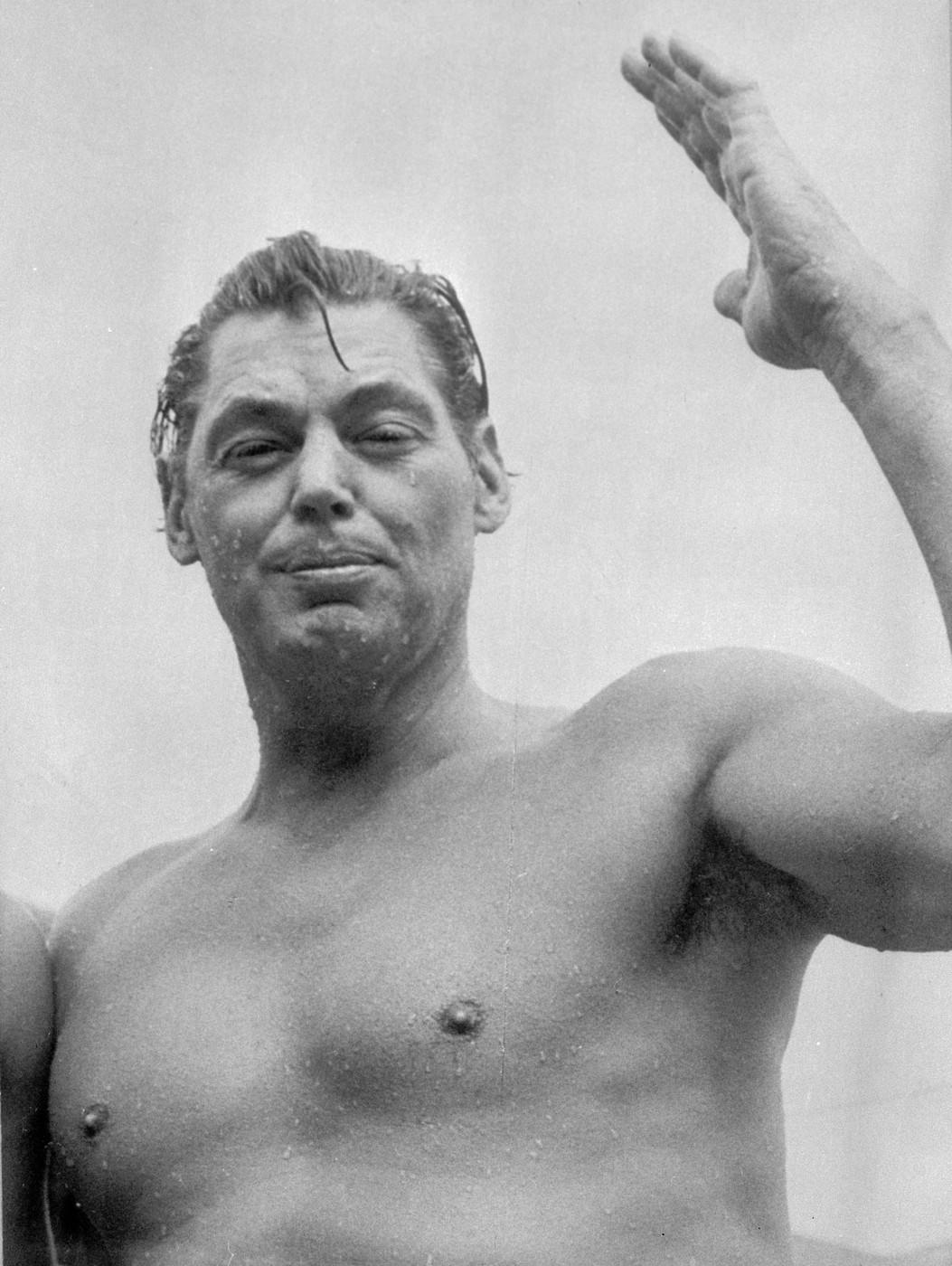 Johnny Weissmuller, americký rekordman v plavání, představitel filmového 