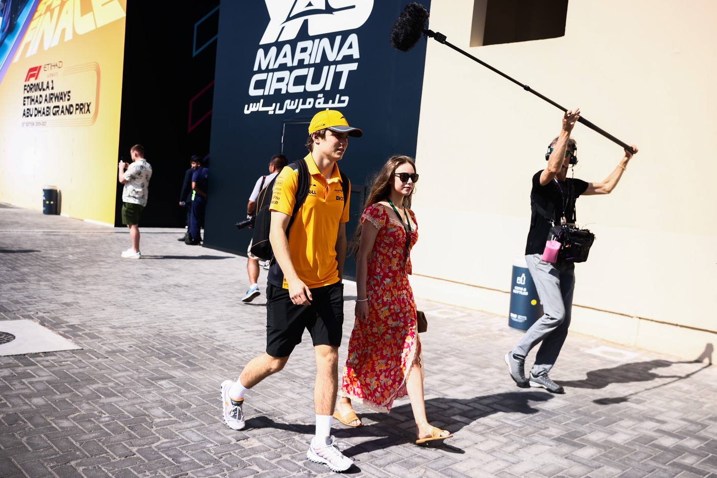 November 26, 2023, Abu Dhabi, United Arab Emirates: Oscar Piastri of McLaren and his girlfriend Lily Zneimer are seen in a paddock ahead ahead of Formula 1 Abu Dhabi Grand Prix at Yas Marina Circuit on November 26, 2023 in Abu Dhabi, United Arab Emirates.,Image: 824386579, License: Rights-managed, Restrictions: , Model Release: no