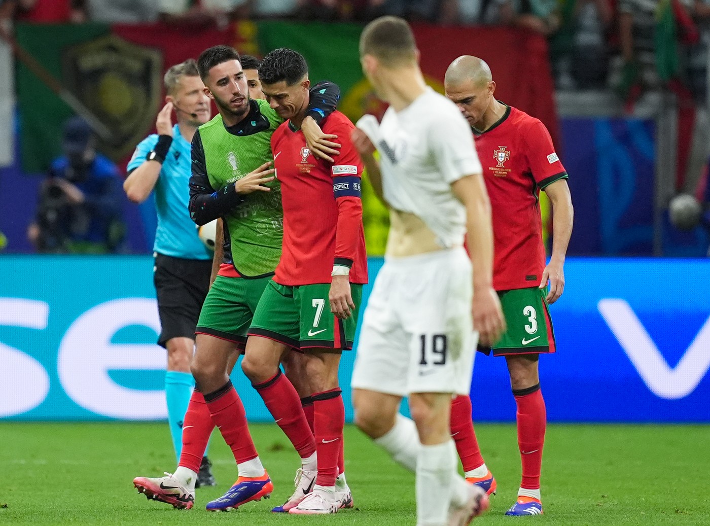 Portugal's Cristiano Ronaldo is consoled after missing a penalty during the UEFA Euro 2024, round of 16 match at the Frankfurt Arena in Frankfurt, Germany. Picture date: Monday July 1, 2024.,Image: 886405789, License: Rights-managed, Restrictions: Use subject to restrictions. Editorial use only, no commercial use without prior consent from rights holder., Model Release: no