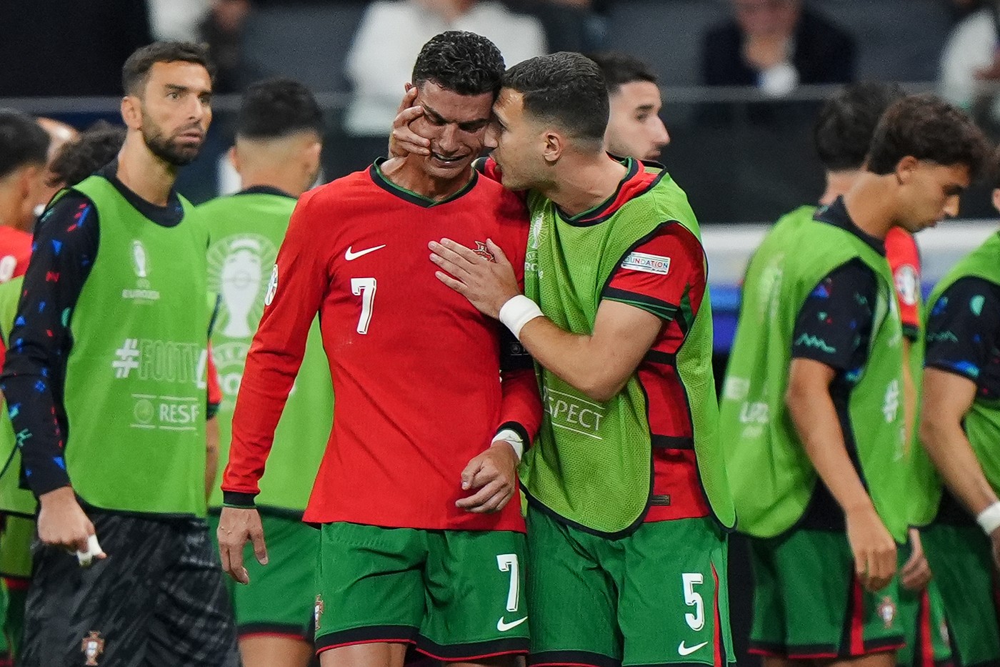 Portugal's Cristiano Ronaldo is consoled by Diogo Dalot at half-time of extra-time after missing a penalty during the UEFA Euro 2024, round of 16 match at the Frankfurt Arena in Frankfurt, Germany. Picture date: Monday July 1, 2024.,Image: 886405838, License: Rights-managed, Restrictions: Use subject to restrictions. Editorial use only, no commercial use without prior consent from rights holder., Model Release: no
