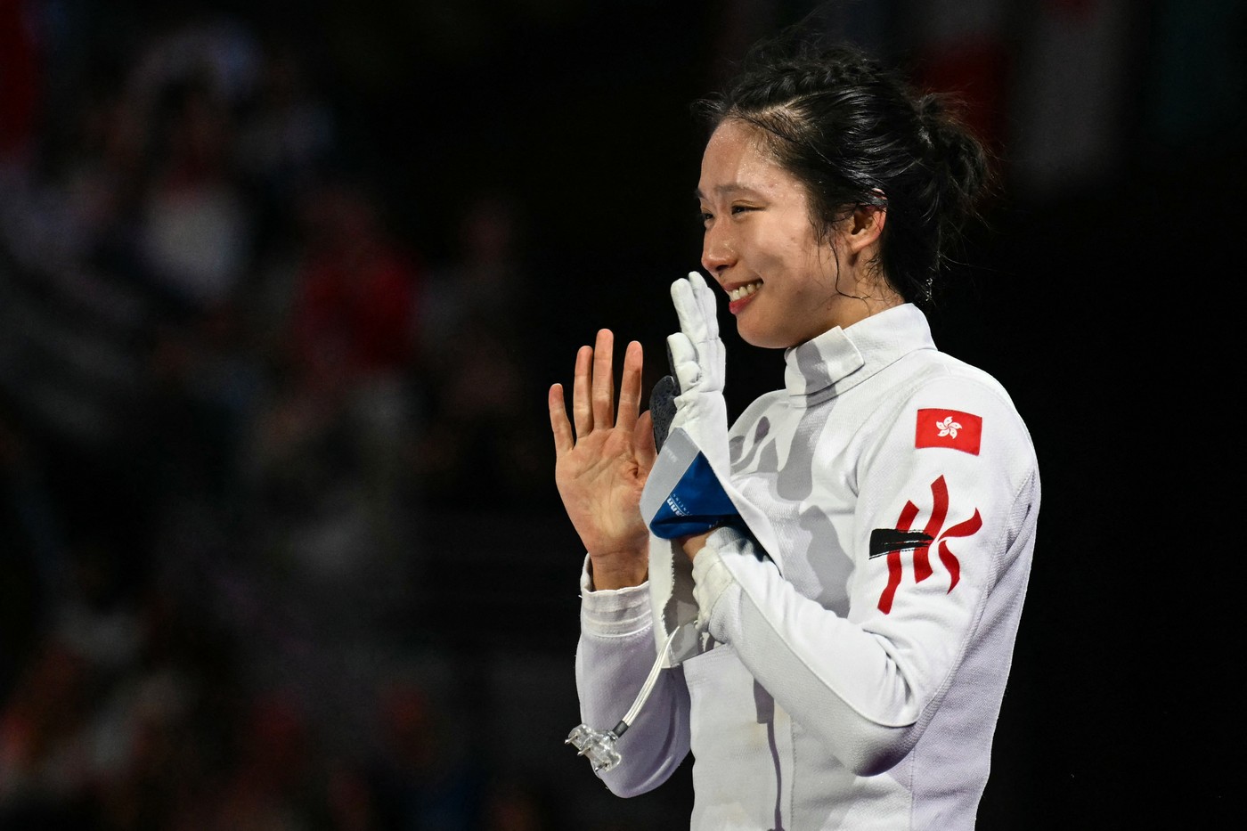 Hong Kong's Kong Man Wai Vivian celebrates after winning against France's Auriane Mallo-Breton in the women's epee individual gold medal bout during the Paris 2024 Olympic Games at the Grand Palais in Paris, on July 27, 2024.,Image: 893109054, License: Rights-managed, Restrictions: , Model Release: no