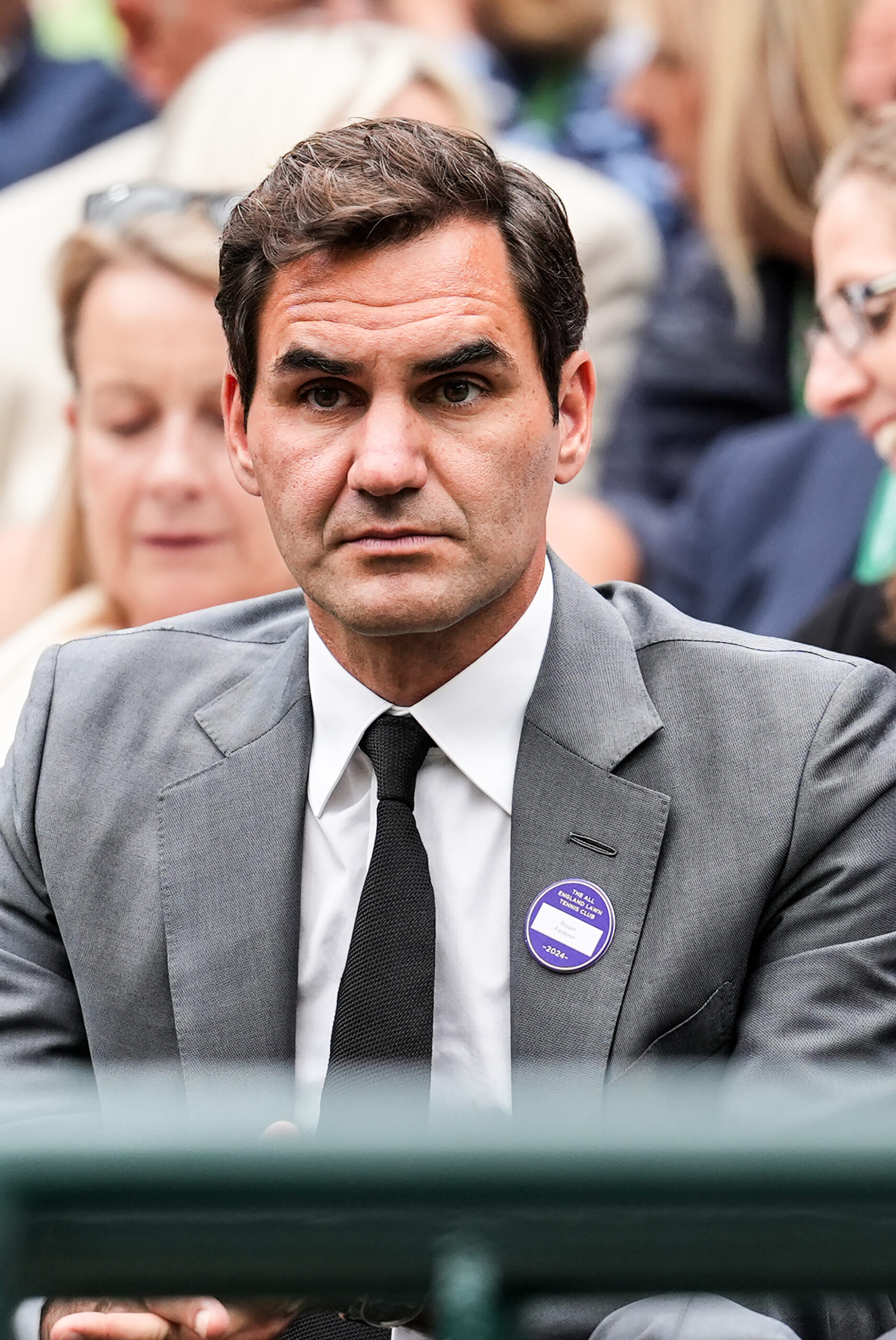 LONDON, ENGLAND - JULY 06: Roger Federer looks on during the Gentlemen's Singles third round match between Ben Shelton of United States plays against Denis Shapovalov of Canada during day six of The Championships Wimbledon 2024 at All England Lawn Tennis and Croquet Club on July 06, 2024 in London, England. (Photo by Shi Tang/Getty Images)