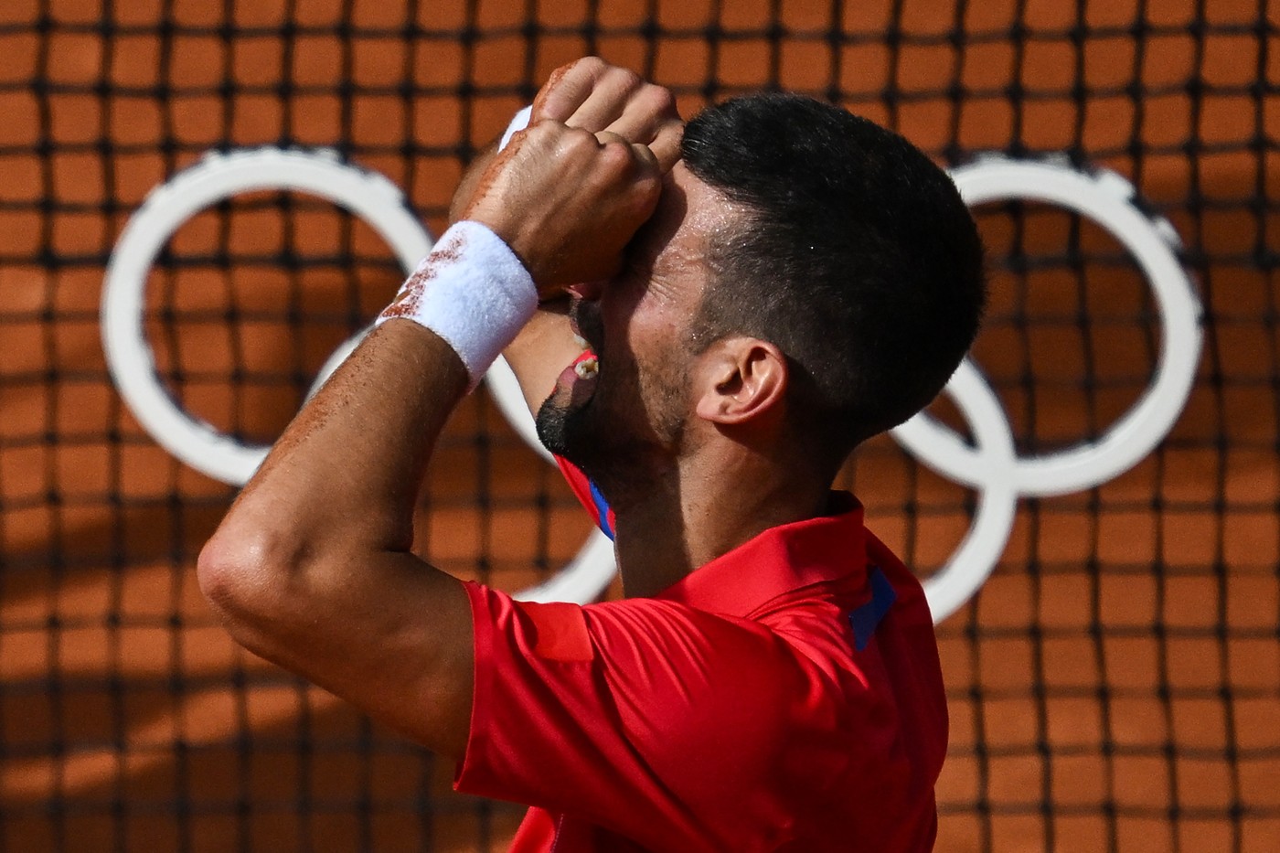 04 August 2024, France, Paris: Olympia, Paris 2024, Tennis, Singles, Men, Final, Djokovic (Serbia) - Alcaraz (Spain), Novak Djokovic celebrates after the match.,Image: 895907770, License: Rights-managed, Restrictions: , Model Release: no