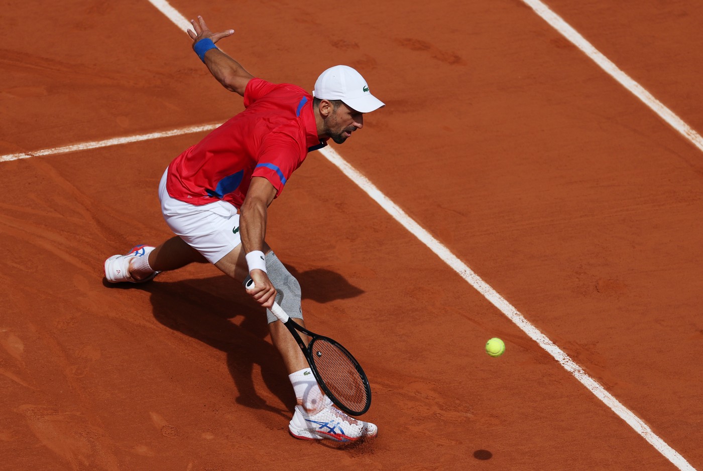 PARIS, Aug. 4, 2024  -- Novak Djokovic of Serbia competes during the men's singles gold medal match of tennis between Novak Djokovic of Serbia and Carlos Alcaraz of Spain at the Paris 2024 Olympic Games in Paris, France, on Aug. 4, 2024.,Image: 895908343, License: Rights-managed, Restrictions: , Model Release: no