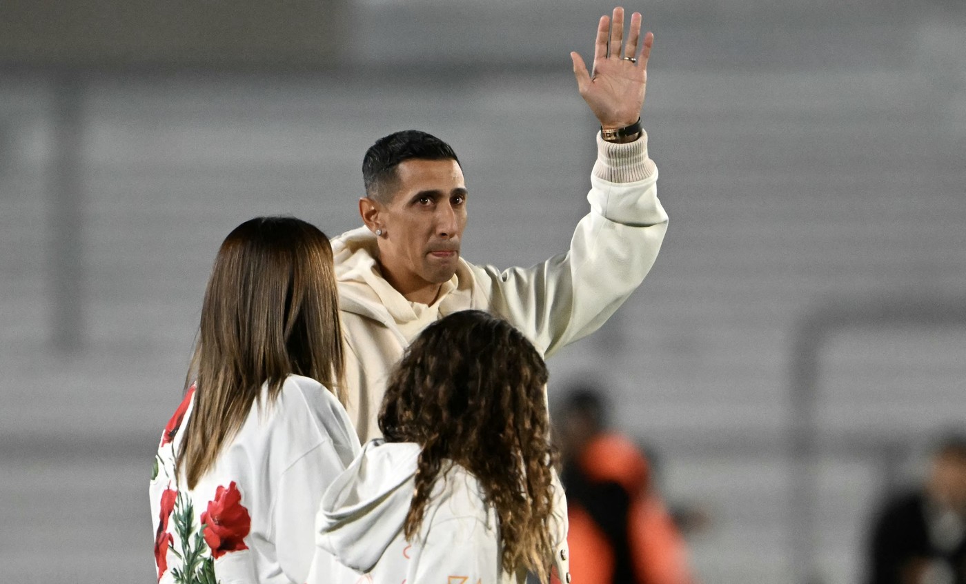 Argentina's midfielder Angel Di Maria (C), accompanied by his wife Jorgelina Cardoso (L) and their daughter Mia, waves to the crowd during a tribute after retiring from the Argentine national team before the 2026 FIFA World Cup South American qualifiers football match between Argentina and Chile at the Mas Monumental stadium in Buenos Aires on September 5, 2024.,Image: 905141874, License: Rights-managed, Restrictions: , Model Release: no