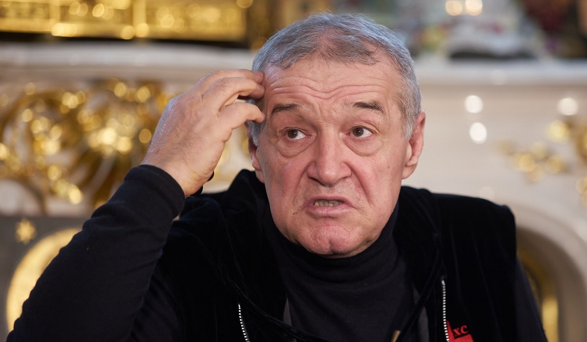 Gigi Becali duce mâna la cap