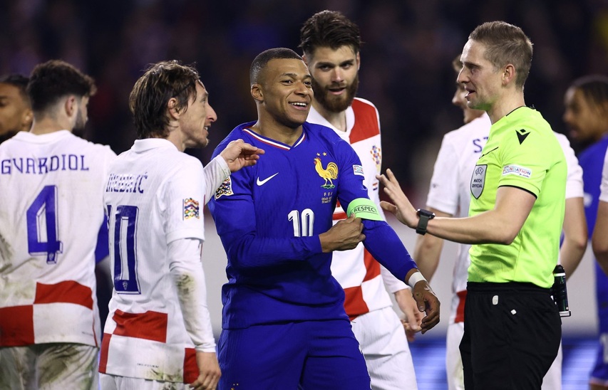 Luka Modric şi Kylian Mbappe