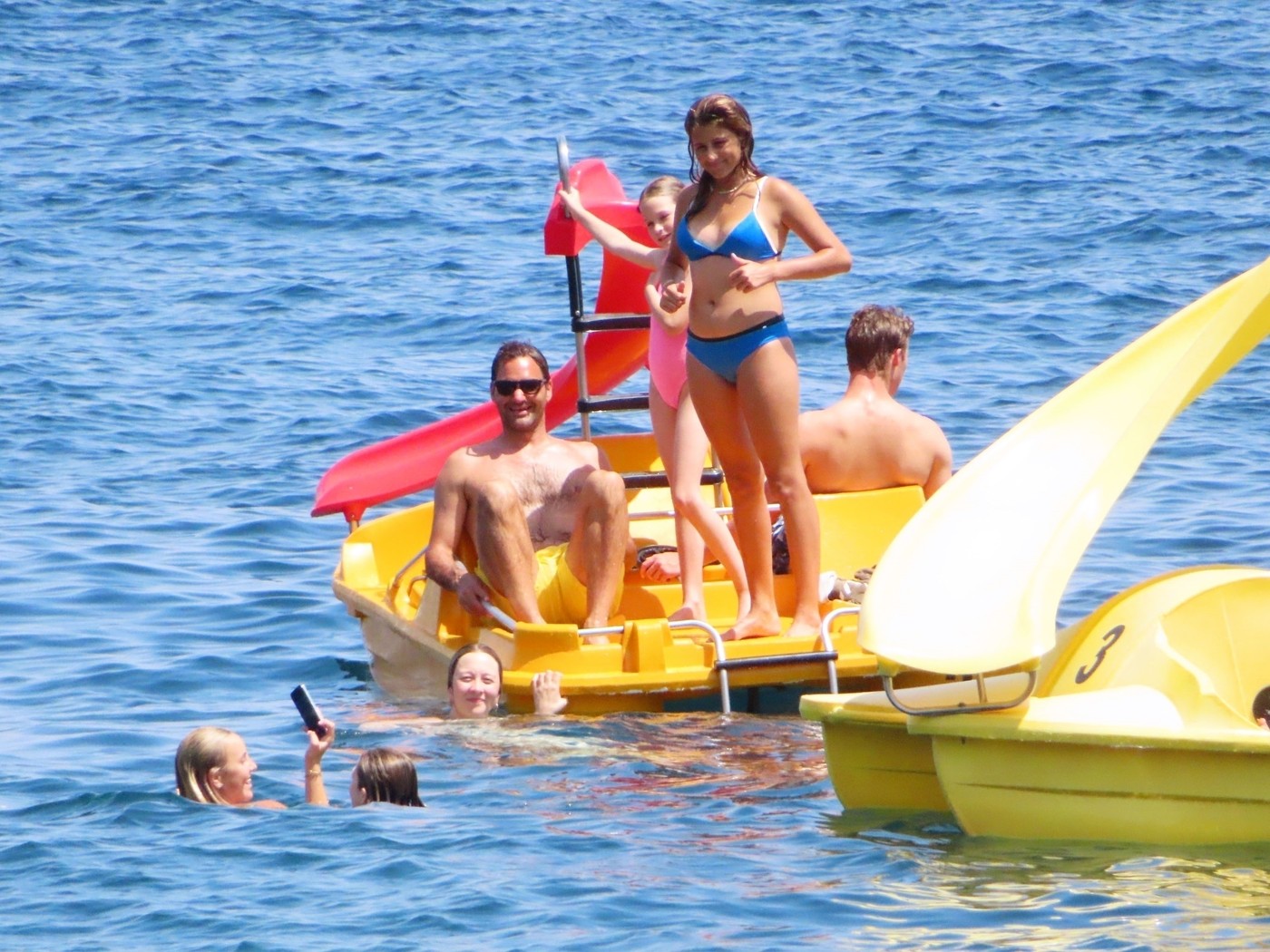 PALMA DE MALLORCA, SPAIN  -  Swiss tennis player Roger Federer is all smiles as he's pictured enjoying a summer holiday with his wife Mirka Federer and friends in Majorca.

The Tennis star was seen looking relaxed as he enjoyed a swim with his partner and was also joined by German tennis player Tommy Haas.

BACKGRID UK 19 JULY 2023,Image: 790909352, License: Rights-managed, Restrictions: RIGHTS:  BRAZIL, FRANCE, MEXICO, PORTUGAL, ITALY, ARGENTINA, JAPAN, CHINA, KOREA, DENMARK, RUSSIA, UKRAINE, ESTONIA, LITHUANIA, NORWAY, POLAND, SWEDEN, ANGOLA, BOTSWANA, KENYA, LESOTHO, MALAWI, MAURITIUS, MOZAMBIQUE, NAMIBIA, NIGERIA, SOUTH AFRICA, ZAMBIA, ZIMBABWE, BULGARIA, HUNGARY, ROMANIA, SERBIA, CZECH REPUBLIC, SLOVAKIA, BELARUS, ICELAND, IRELAND, LATVIA, MOLDOVA, SLOVENIA, COSTA RICA, CUBA, DOMINICA, DOMINICAN REPUBLIC, EL SALVADOR, GRENADA, GUATEMALA, NICARAGUA, PANAMA, PUERTO RICO, BOLIVIA, CHILE, COLOMBIA, ECUADOR, FRENCH GUIANA, GUYANA, PARAGUAY, PERU, SURINAME, URUGUAY, VENEZUELA, CYPRUS, BELGIUM, NETHERLANDS, INDONESIA, NORTH KOREA, PHILIPPINES, TURKEY, BOSNIA, CROATIA, LUXEMBOURG, BAHAMAS, BARBADOS, BELIZE, HAITI, HONDURAS, JAMAICA, SCOTLAND, MONACO, TURKS AND CAICOS ISLANDS, EGYPT, AZERBAIJAN, MALTA, LIBYA, MYANMAR, MOROCCO, CAPE VERDE, IVORY COAST, GHANA, MALDIVES, JORDAN, IRAN, SAINT BARTHELEMY, SAINT MARTIN, GUADELOUPE, MONTENEGRO, LEBANON, MALAYSIA, UGANDA, CURACAO, CHAD, BANGLADESH, VIETNAM, ETHIOPIA, DJIBOUTI, TUNISIA, ARMENIA, ARUBA, AFGHANISTAN, ALBANIA, ALGERIA, CAYMAN ISLANDS, KAZAKHSTAN, MAURITANIA, SAINT BARTHELEMY, IRAQ, VATICAN CITY, JERSEY, ANDORRA, RWANDA, BENIN, TRINIDAD AND TOBAGO, ANTIGUA AND BARBUDA, Model Release: no, Pictured: Roger Federer